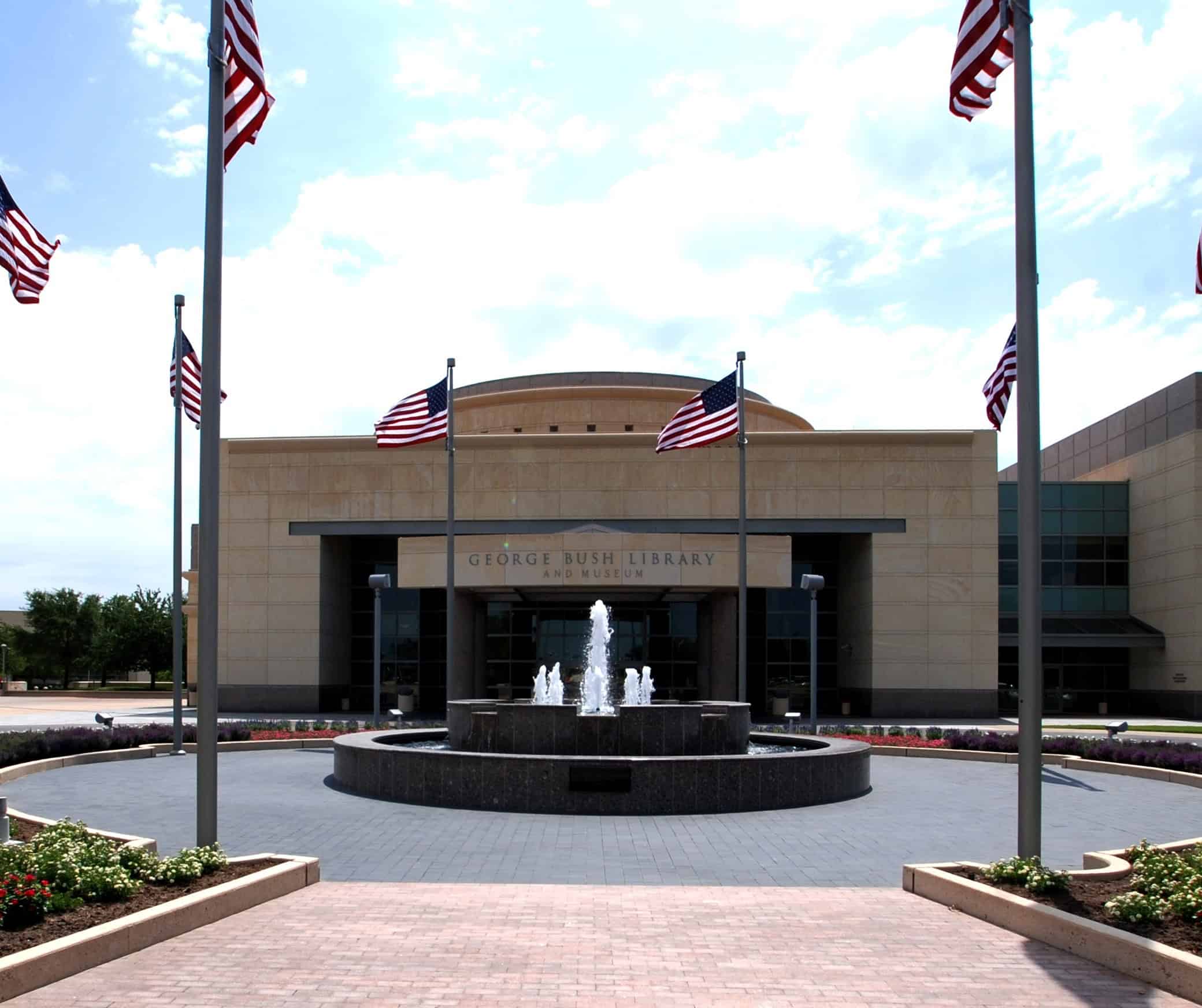 American flags flying outside George Bush Library and Museum, Texas campus.